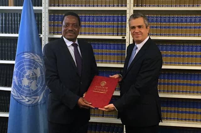 Permanent Representative of Mozambique to the UN, H.E. Mr. Antonio Gumende with the Director of the UN Treaty Section, Dr. Santiago de Villalpando.