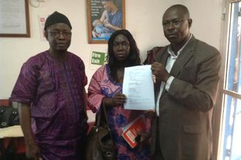 Sierra Leone - PGA Member Dr. Bernadette Lahai MP (Minority Leader) distributes food supplies  to peripheral health units in the frontline of the Ebola fight
